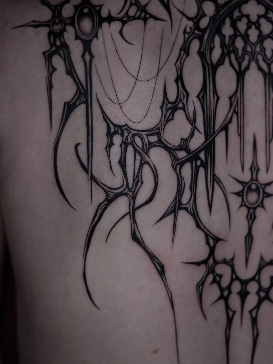 Tattoo by @grxytattoo — blackwork, ornamental