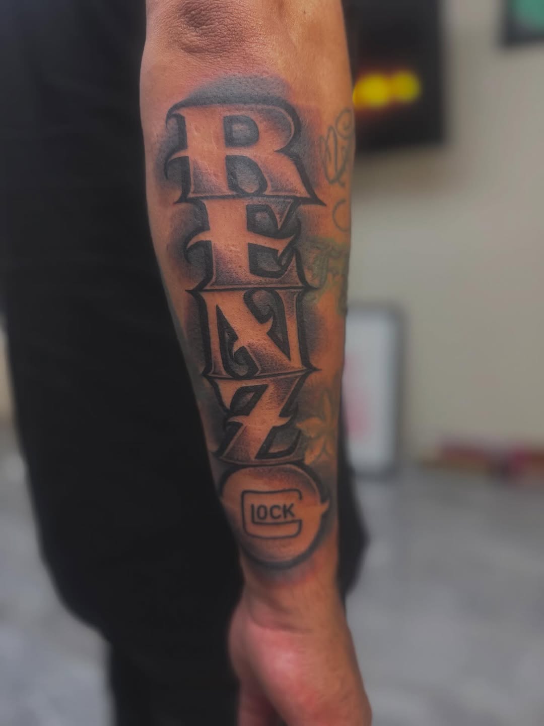 Tattoo by @cesarbee — lettering_script, black_and_grey