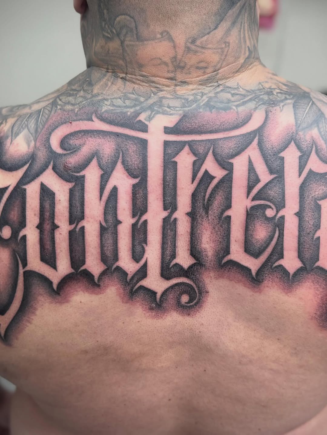 Tattoo by @cesarbee — lettering_script, chicano