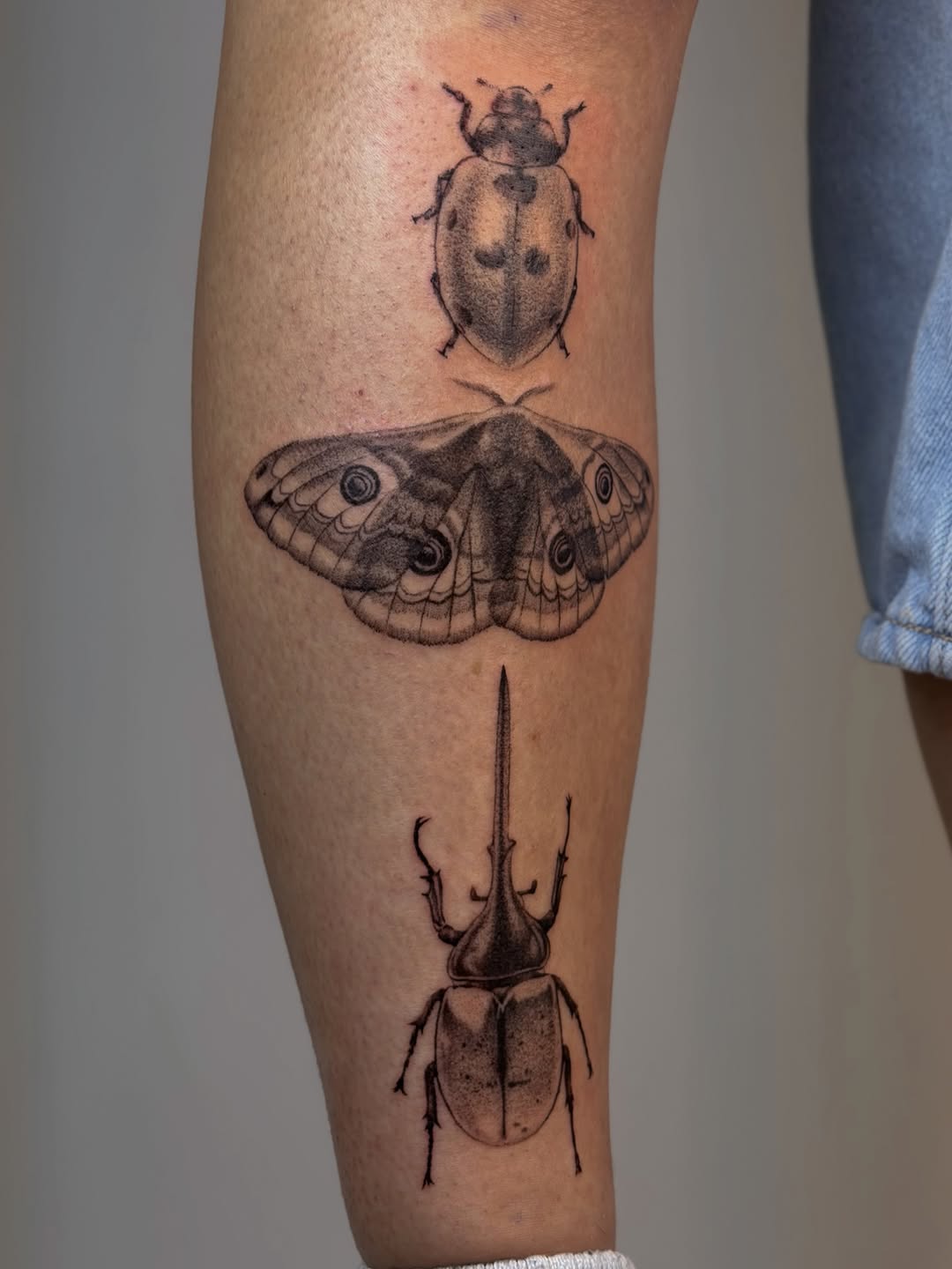 Tattoo by @uglyrae.tattoo — realism, black_and_grey