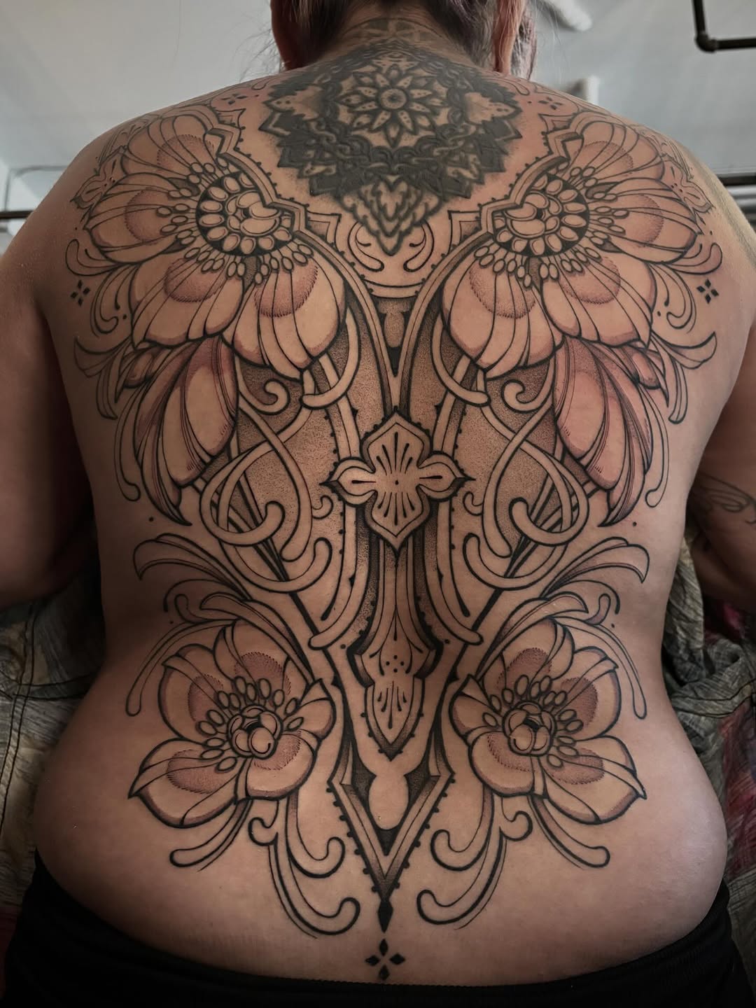 Tattoo by @strangegraves.ink — ornamental, black_and_grey