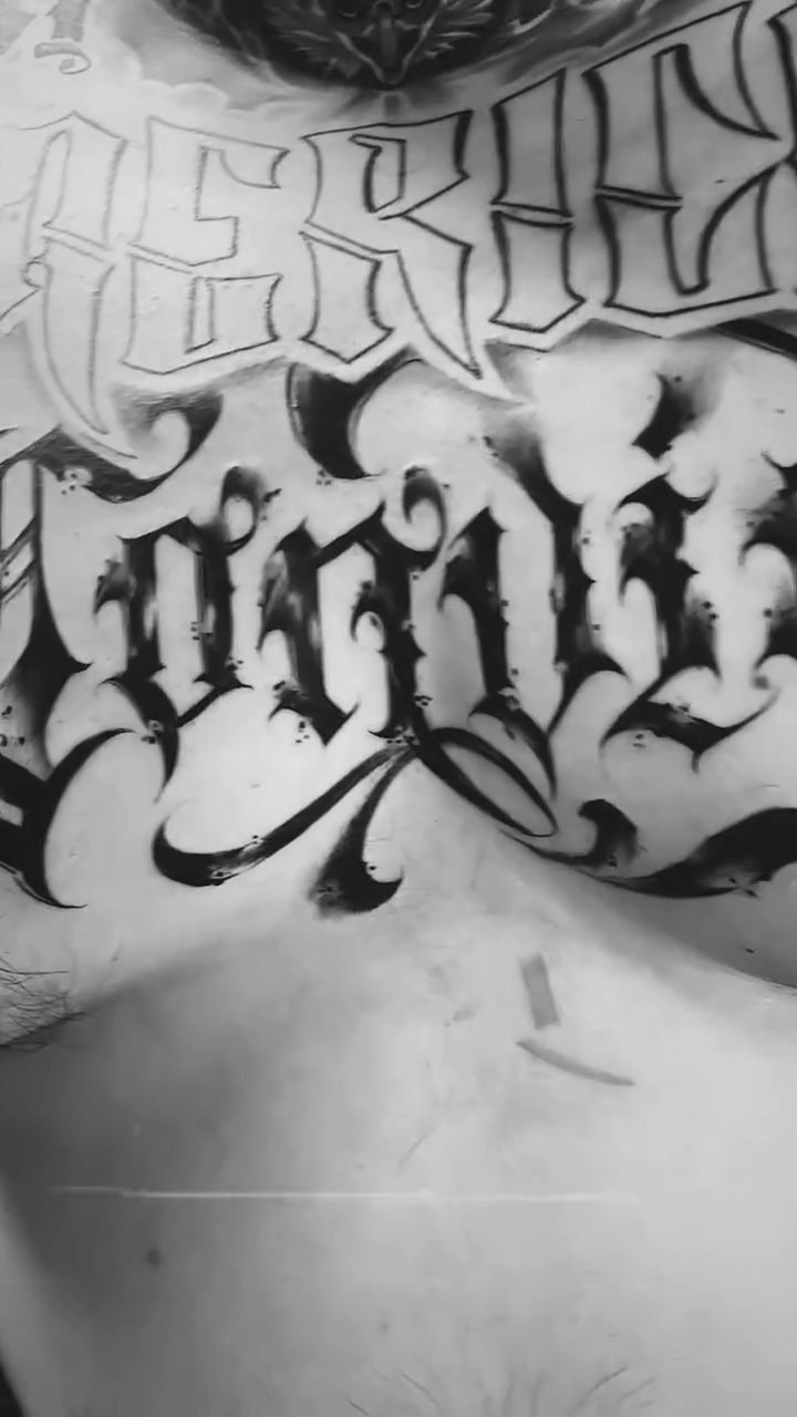 Tattoo by @jokertattoos — lettering_script, chicano