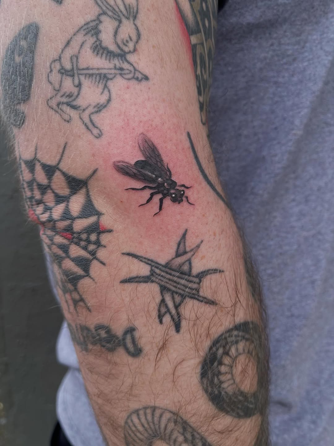 Tattoo by @velvet.snails — realism, black_and_grey