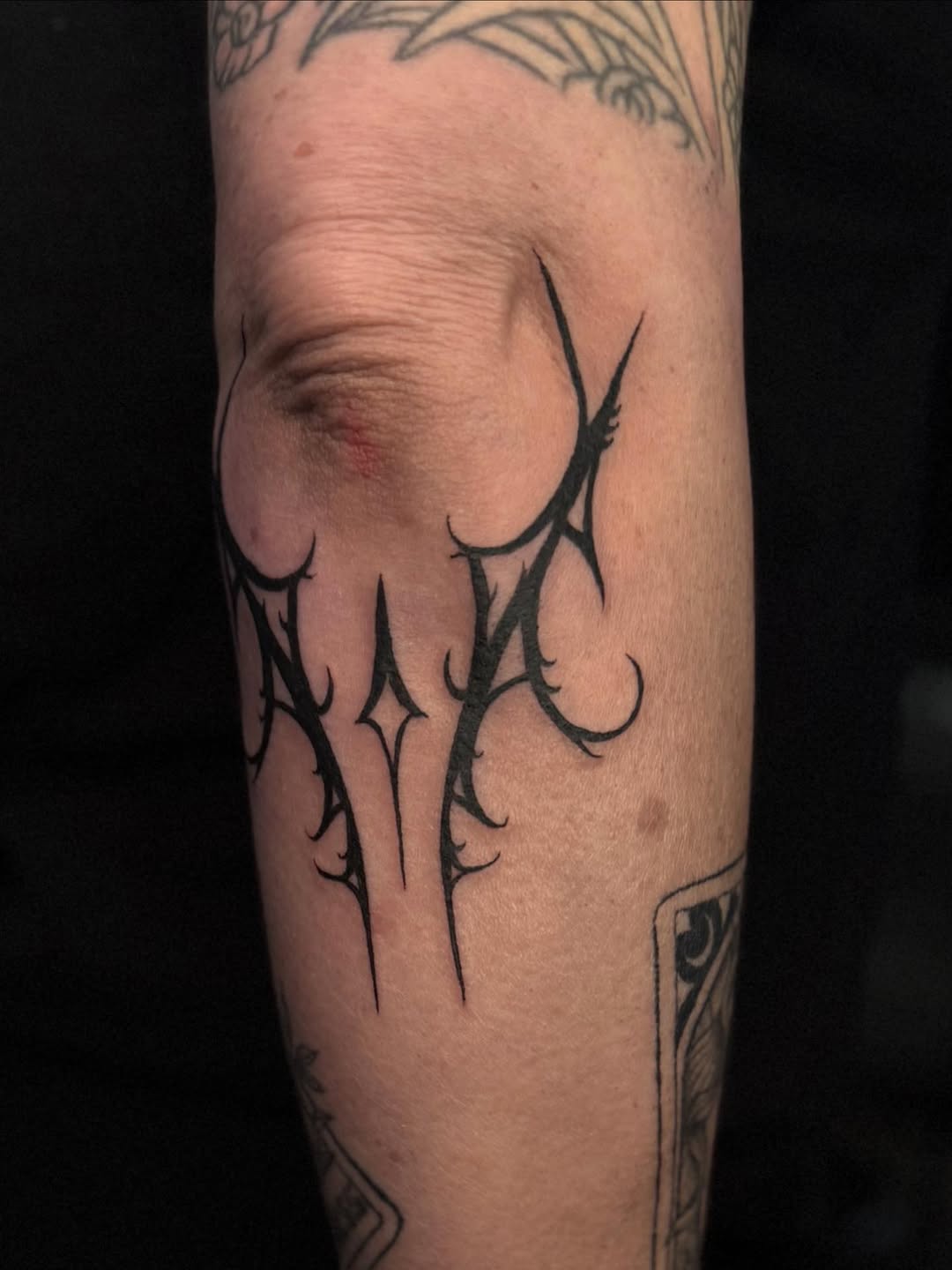 Tattoo by @tinarosetattoos — illustrative, blackwork