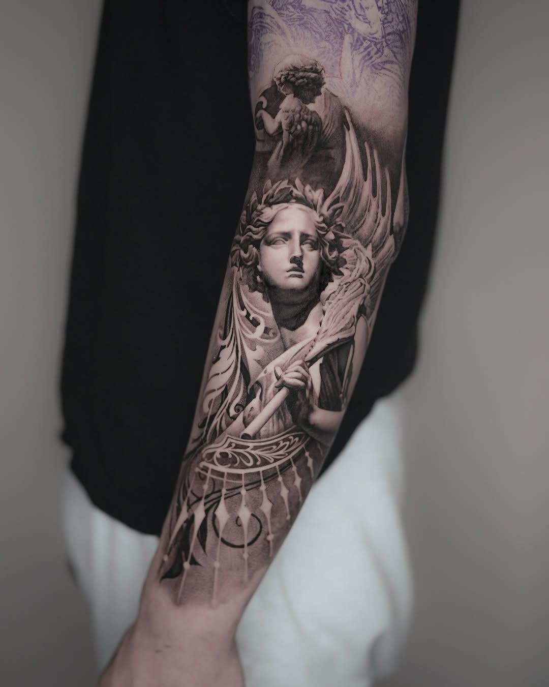 Tattoo by @umzii__tattoo — realism, black_and_grey