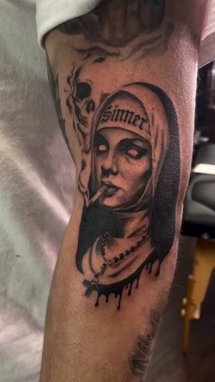 Tattoo by @mikey.ramz — black_and_grey, realism