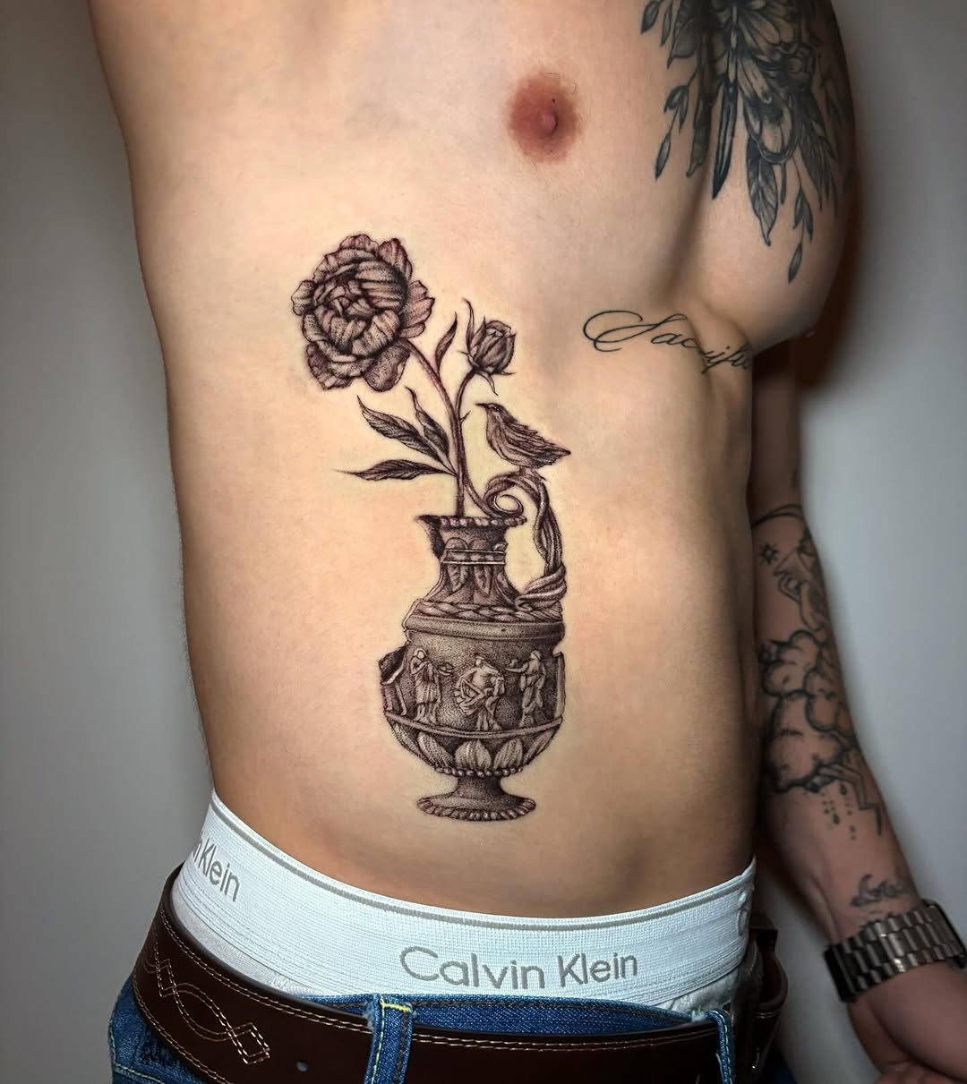 Tattoo by @liz.tattooz — black_and_grey, illustrative