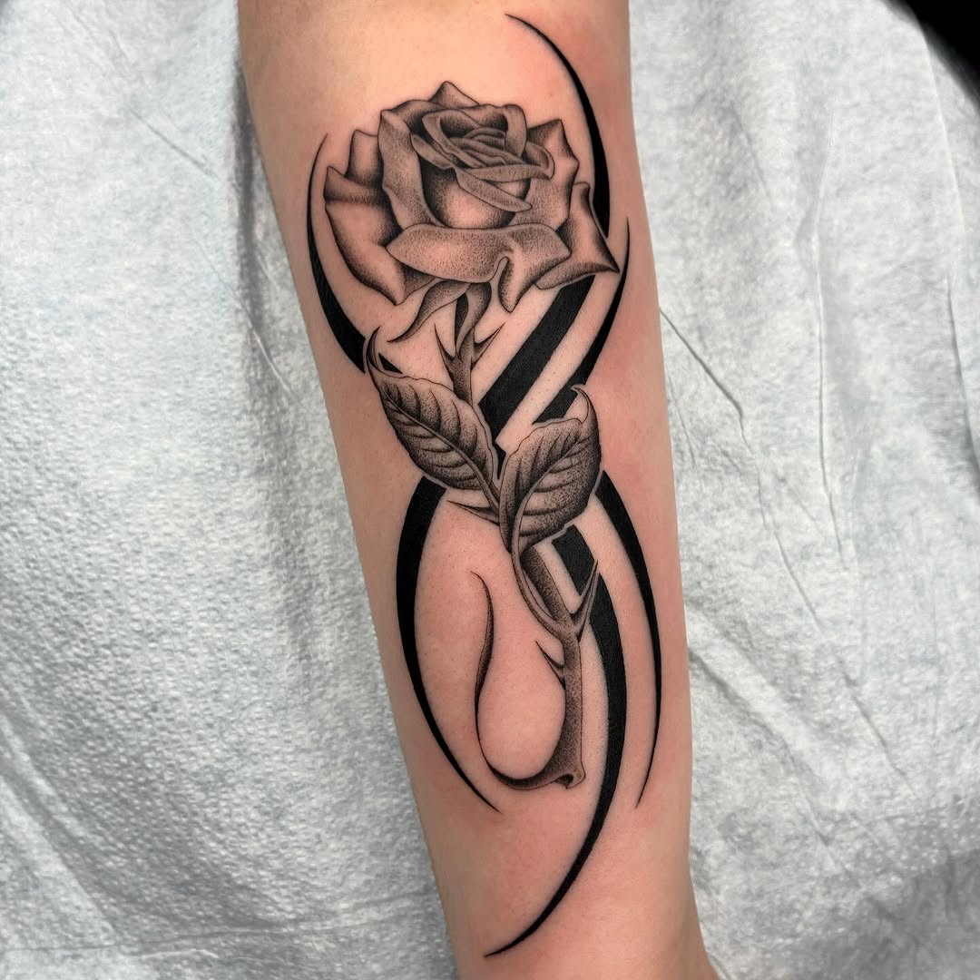 Tattoo by @tiyannagarlic — black_and_grey, realism