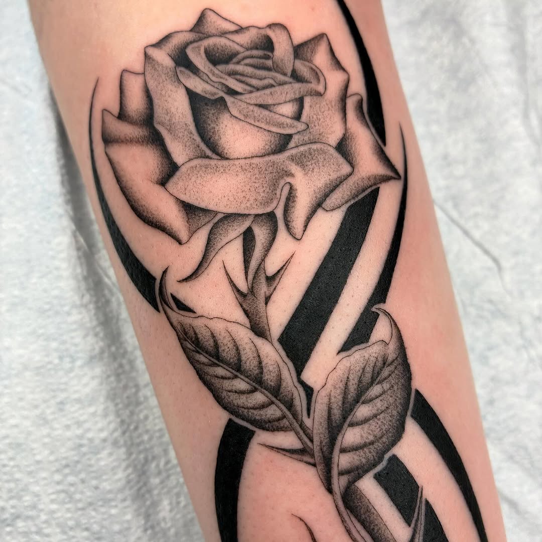 Tattoo by @tiyannagarlic — black_and_grey, realism
