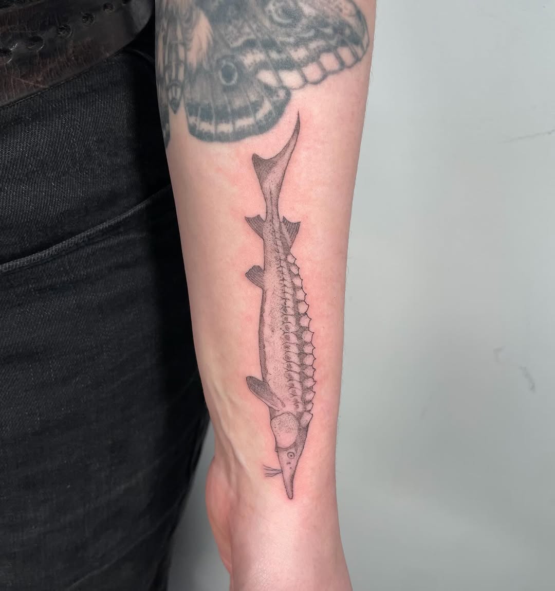 Tattoo by @iris.tats — realism, black_and_grey