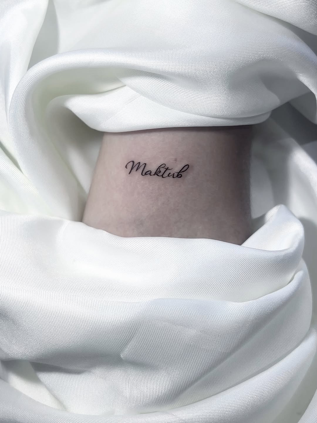 Tattoo by @deza.art — lettering_script, fine_line