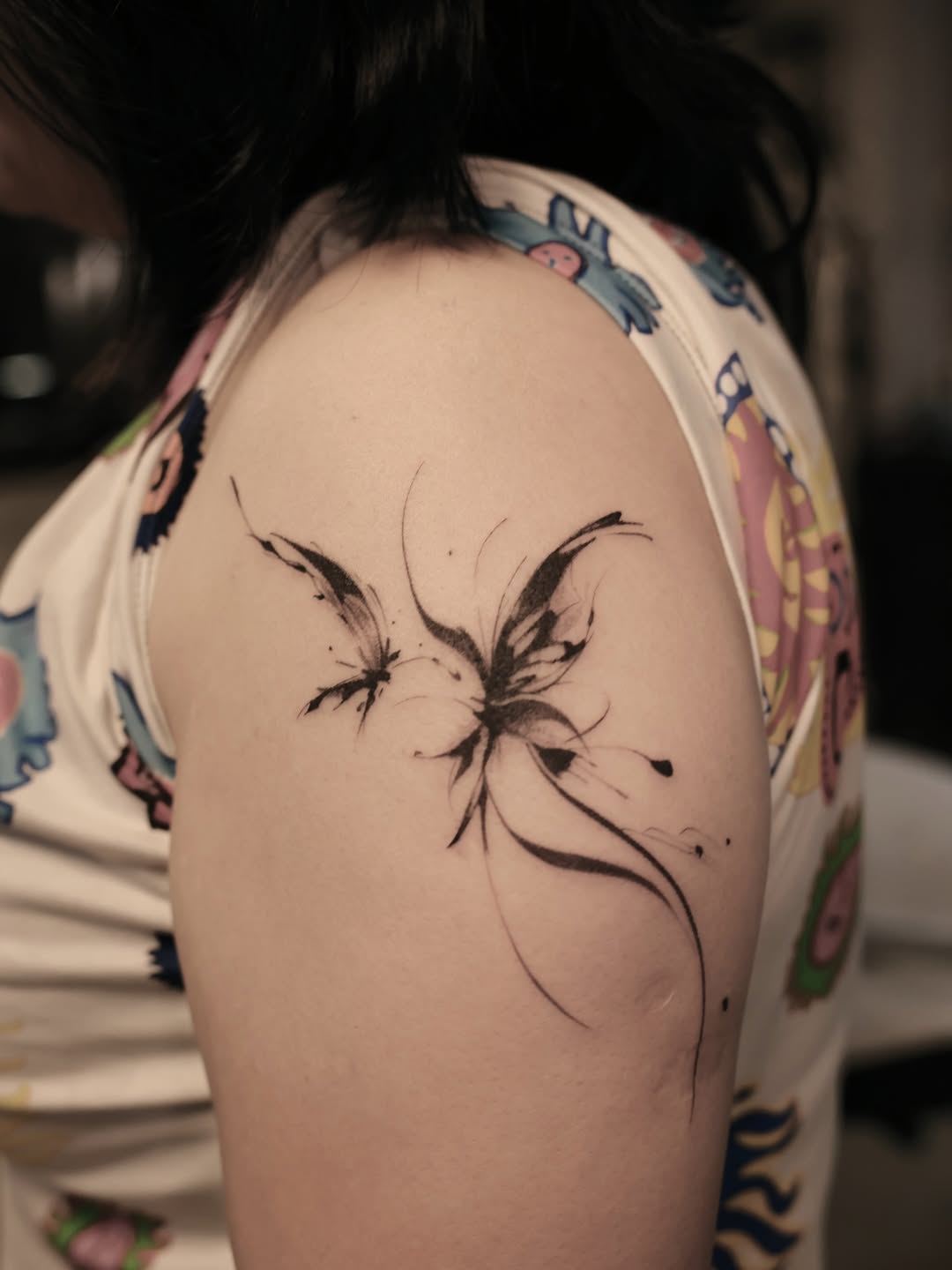 Tattoo by @iris.tatts — fine_line, black_and_grey
