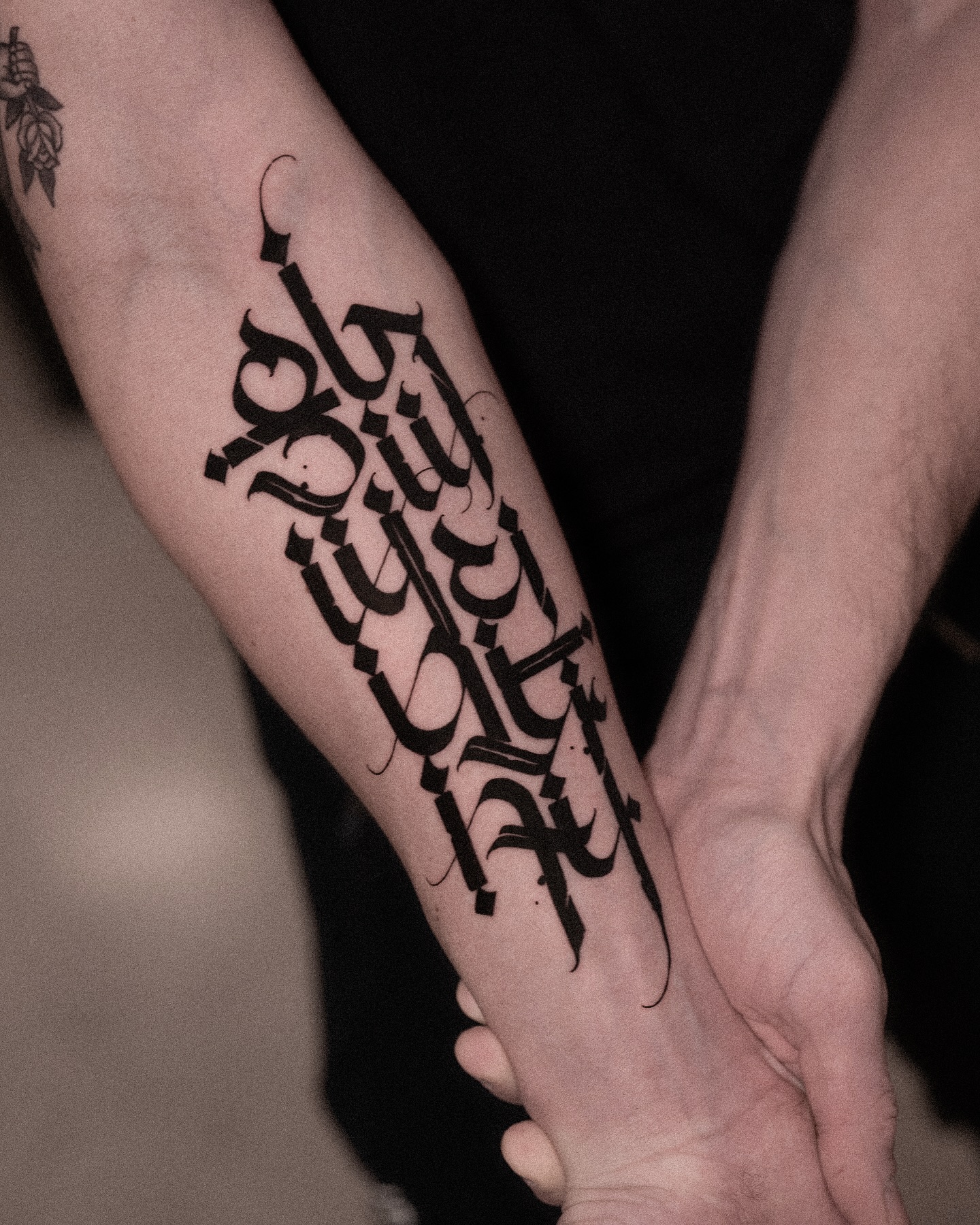 Tattoo by @low.original — lettering_script, blackwork
