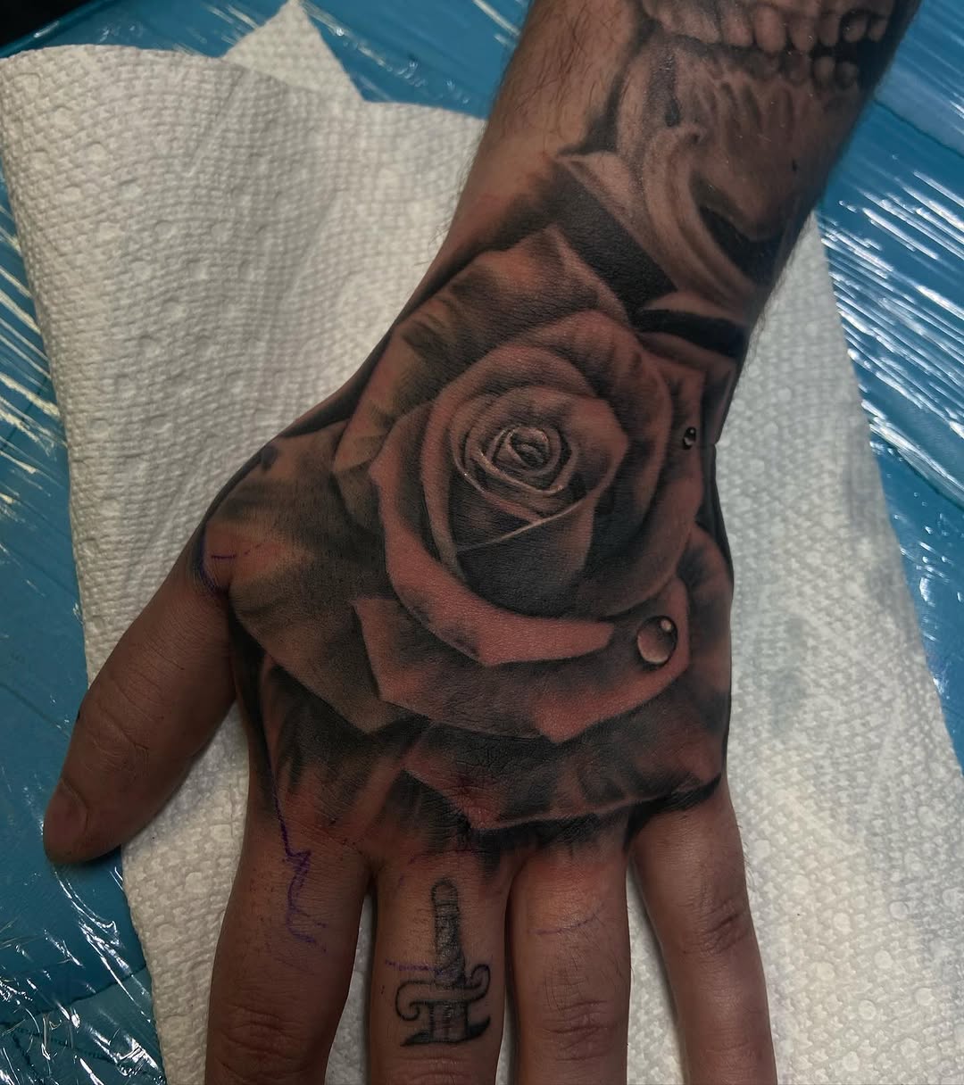 Tattoo by @tatts.by.zack — realism, black_and_grey