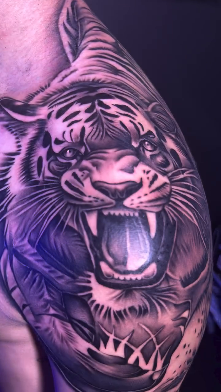 Tattoo by @dropletz619 — black_and_grey, realism