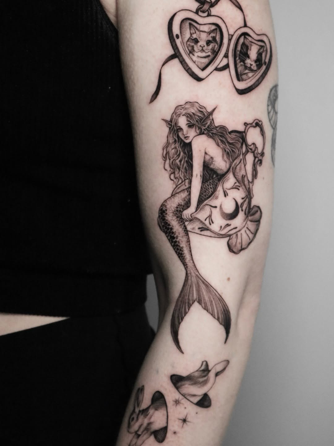 Tattoo by @rit13_ink — realism, black_and_grey