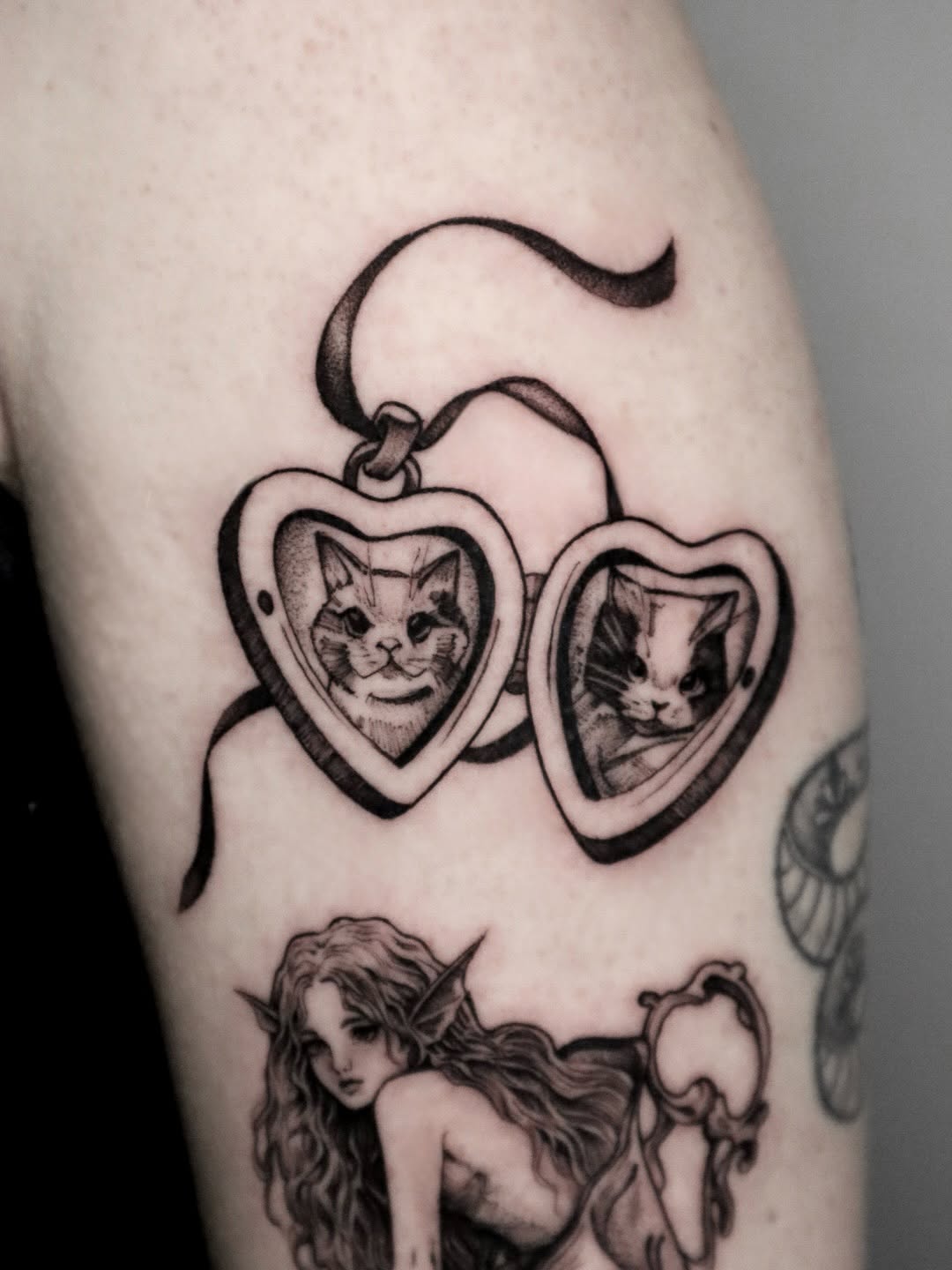 Tattoo by @rit13_ink — realism, black_and_grey