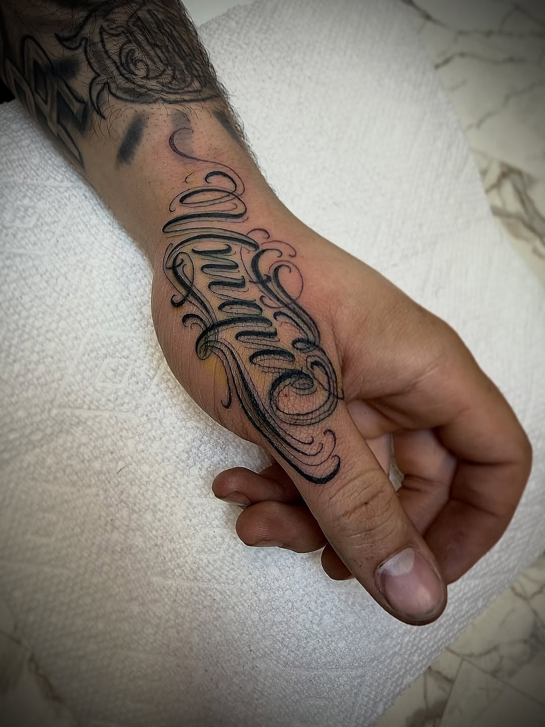 Tattoo by @scriptinator — lettering_script, blackwork
