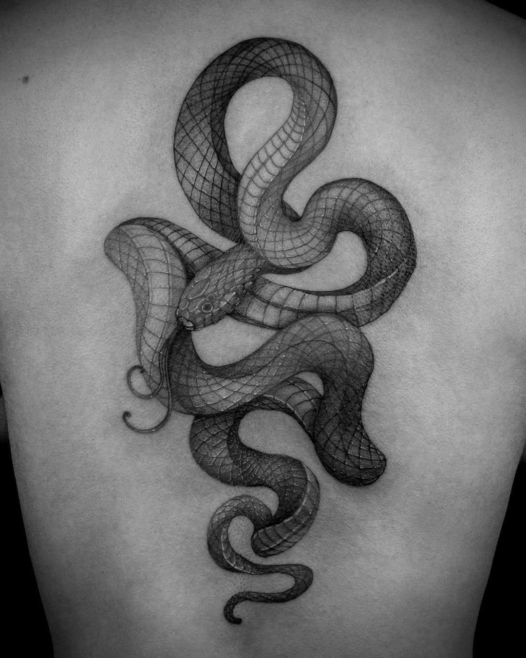 Tattoo by @wong_tattooer — realism, black_and_grey