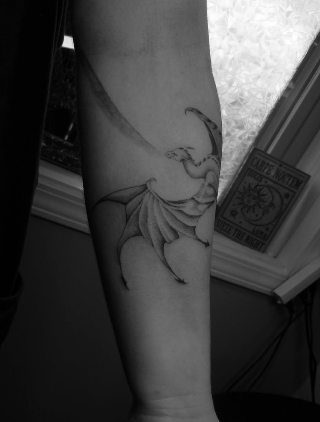 Tattoo by @black.swan.tattoos — realism, black_and_grey