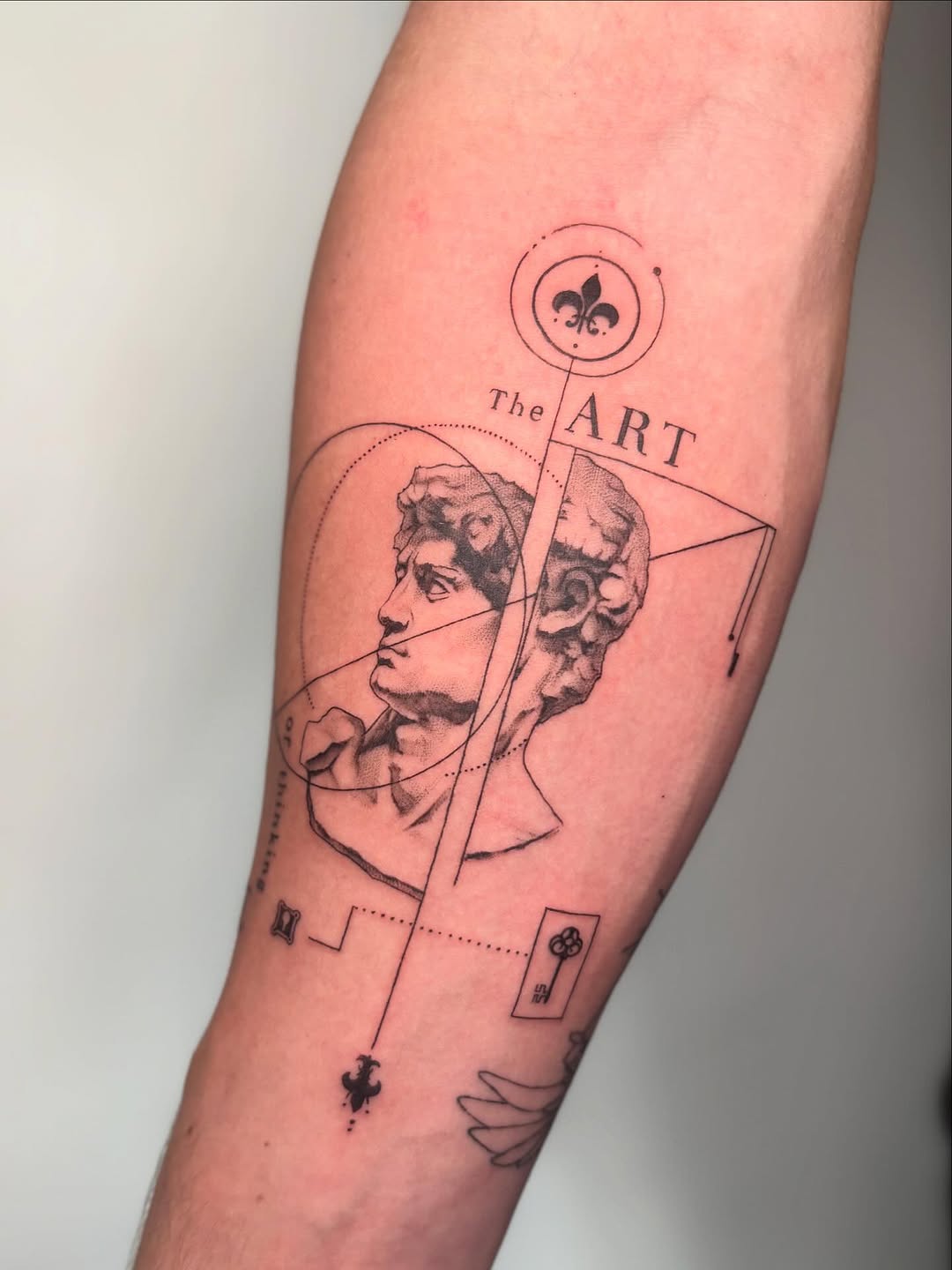 Tattoo by @tattoosbytessa_ — illustrative, geometric