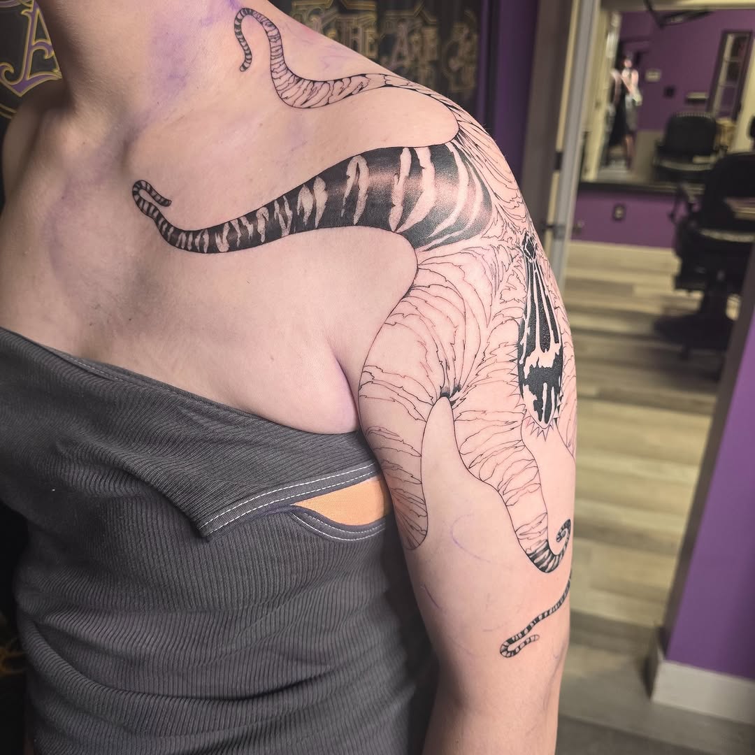 Tattoo by @inked.by.rose — blackwork, realism