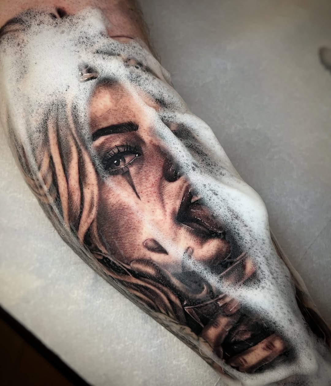 Tattoo by @blot_tattoo — realism, black_and_grey