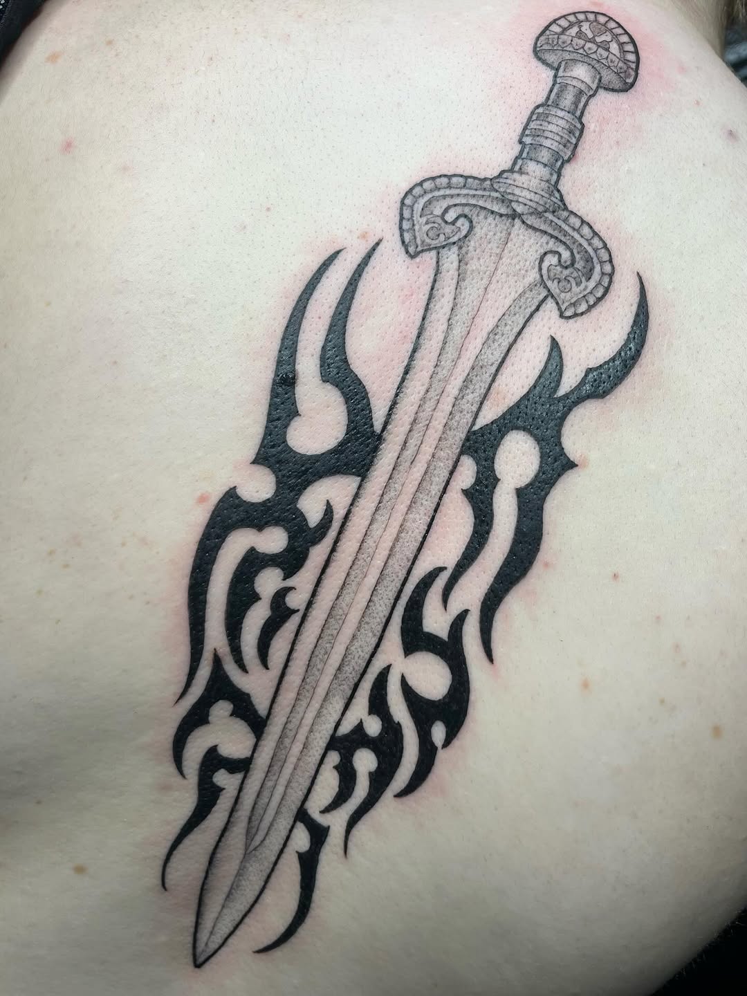 Tattoo by @velesara_tattoo — black_and_grey, tribal