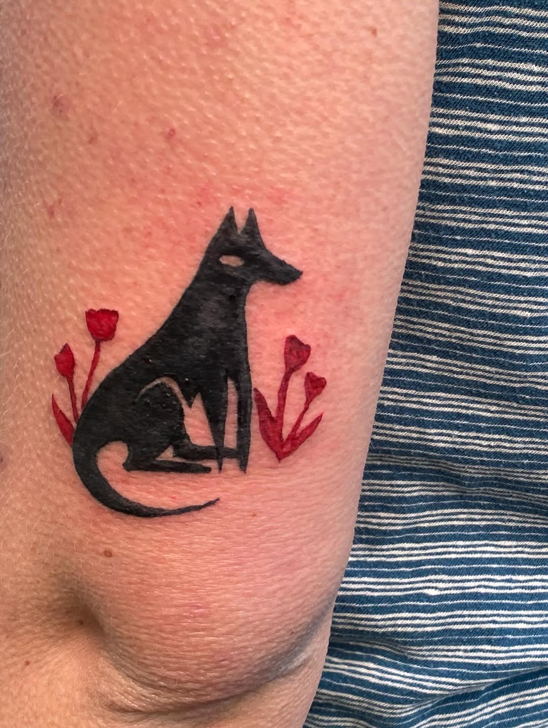 Tattoo by @littleblackdogtattoo — blackwork, minimalist