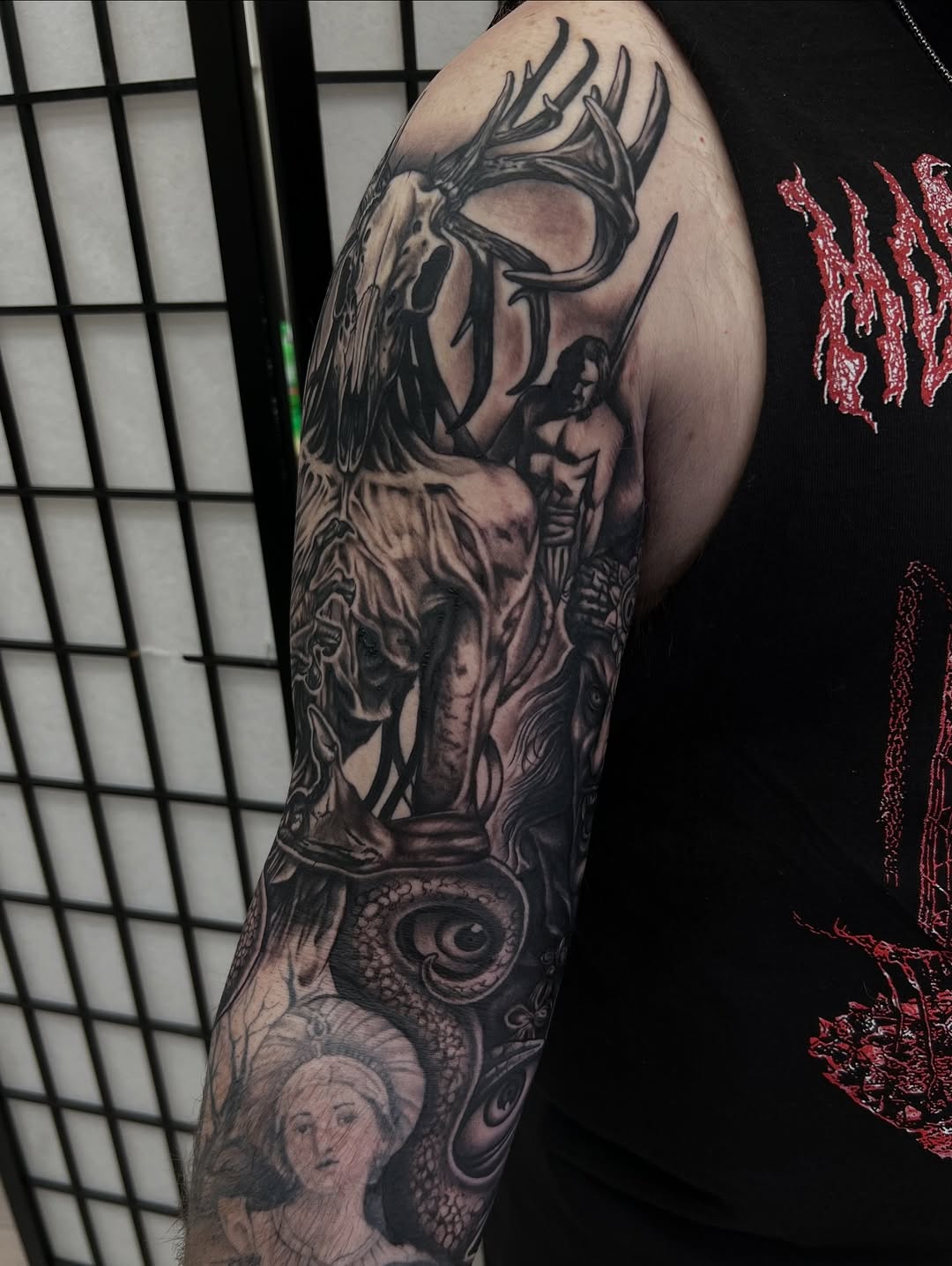 Tattoo by @nickbridwelltattoo — dark_realism, black_and_grey