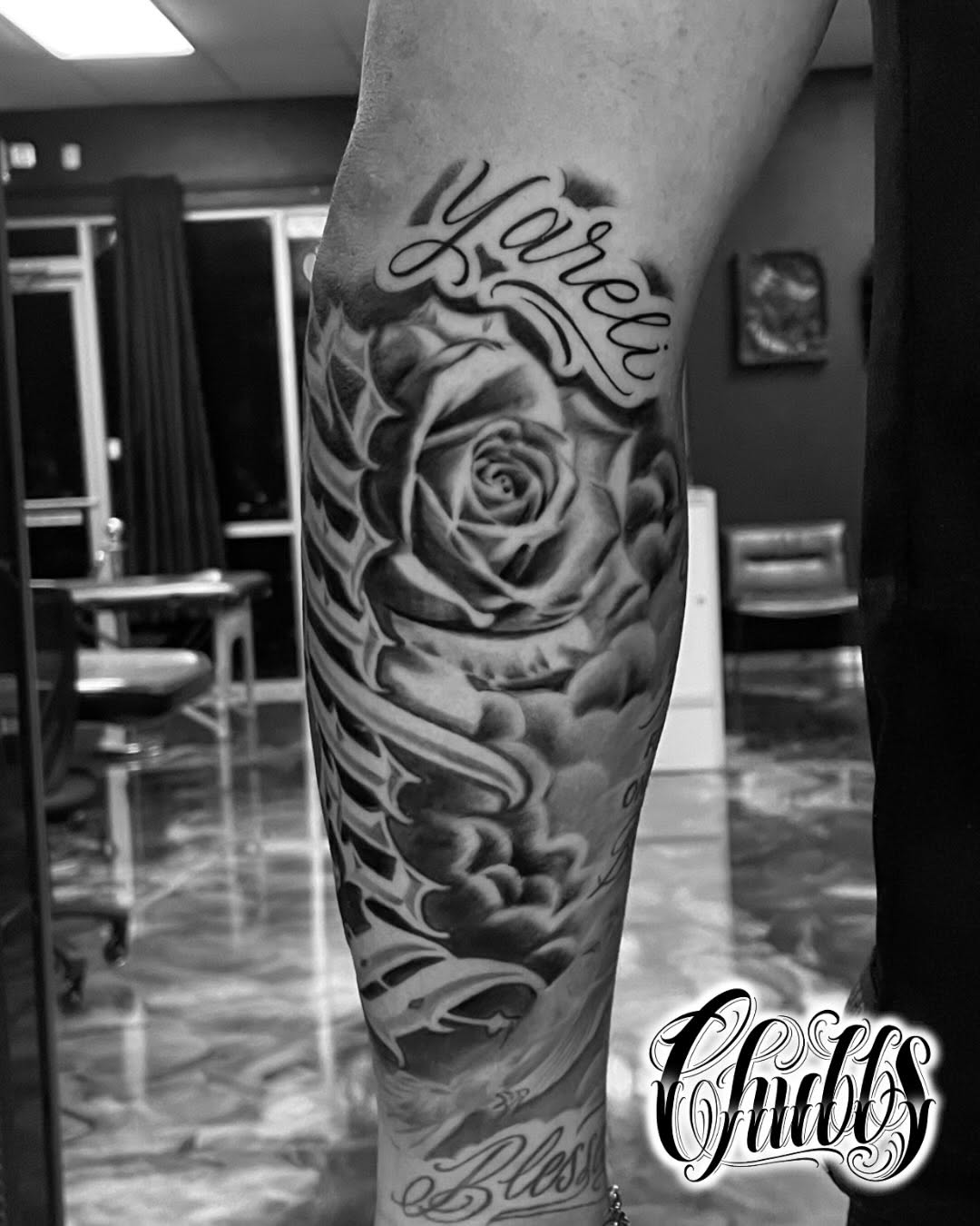 Tattoo by @tatsbychubbs — black_and_grey, chicano