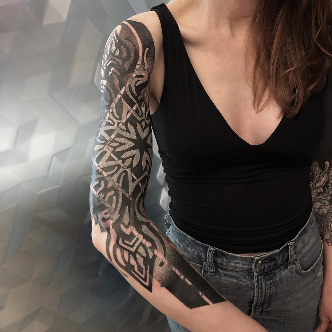Tattoo by @golden.spiral.lola — blackwork, geometric