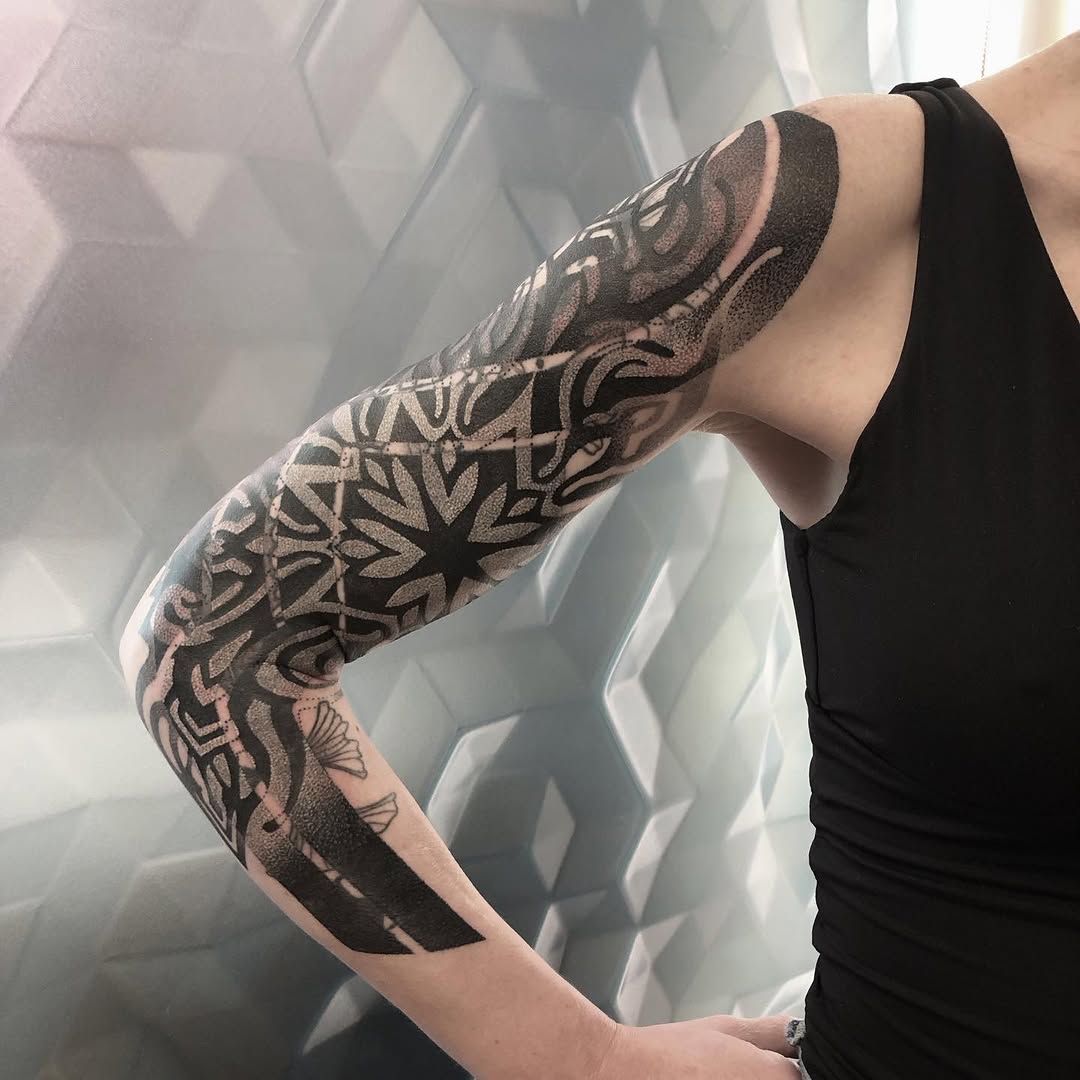 Tattoo by @golden.spiral.lola — geometric, dotwork