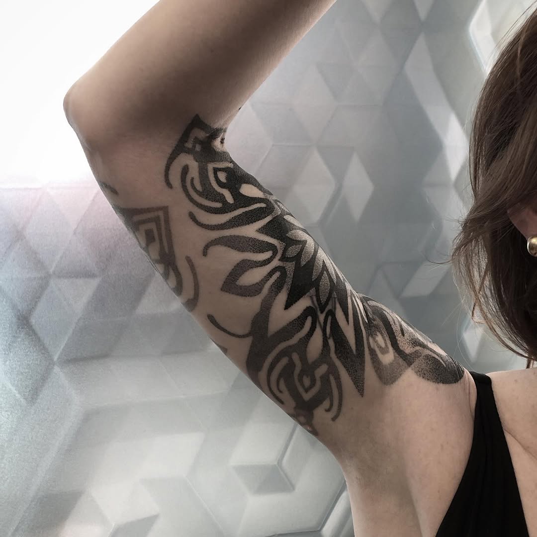 Tattoo by @golden.spiral.lola — dotwork, ornamental