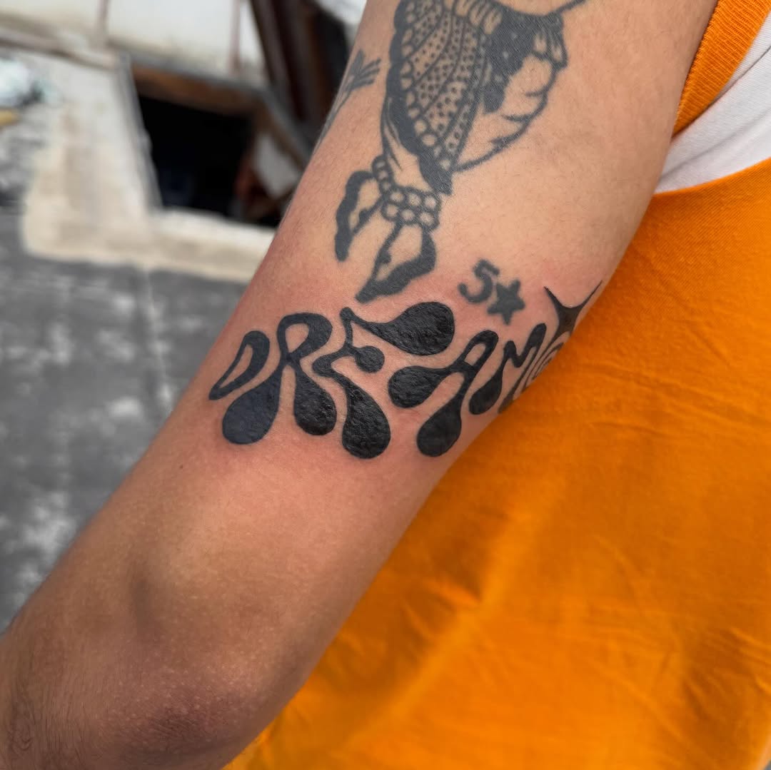 Tattoo by @mr.smiley___ — lettering_script, illustrative