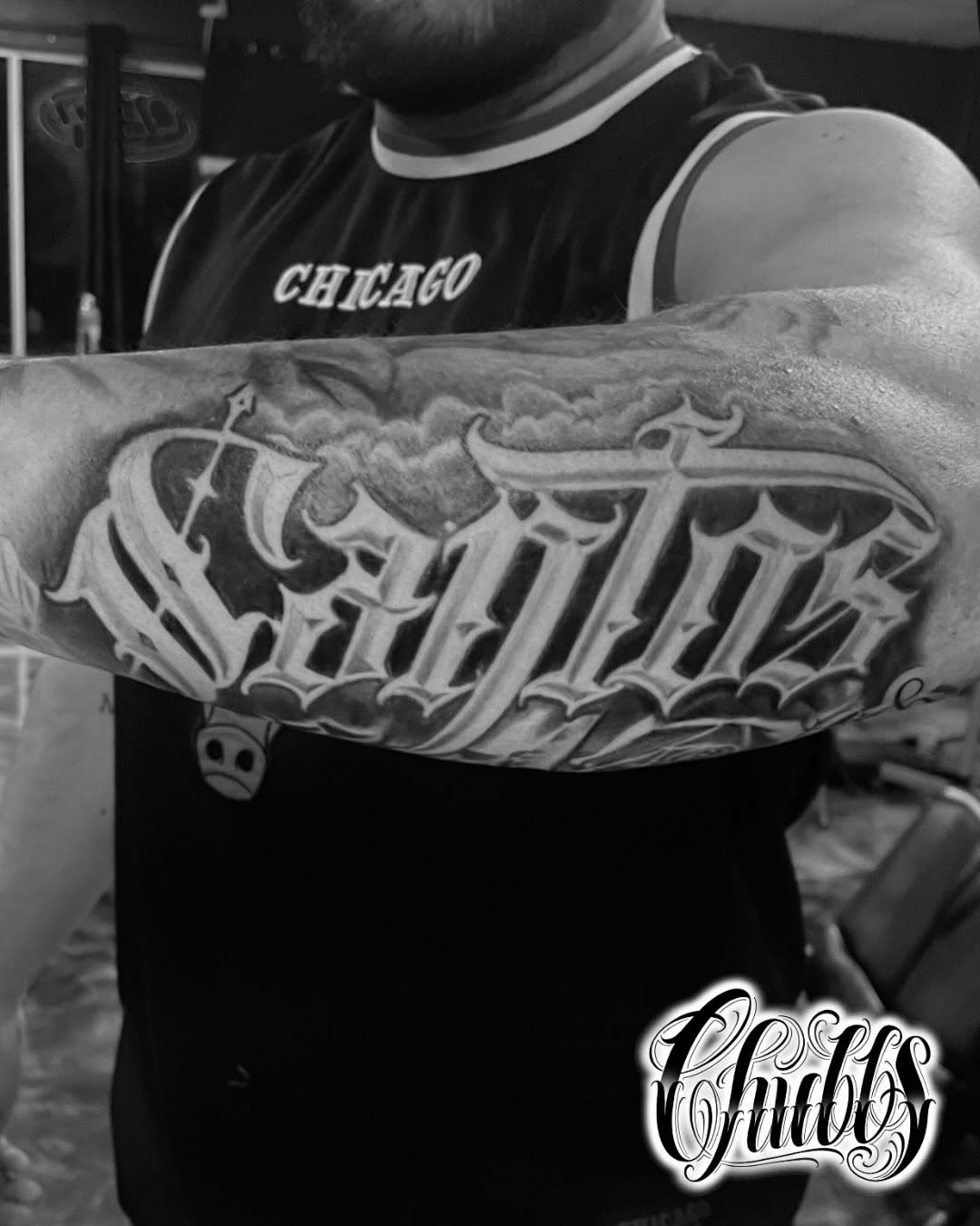 Tattoo by @tatsbychubbs — chicano, lettering_script