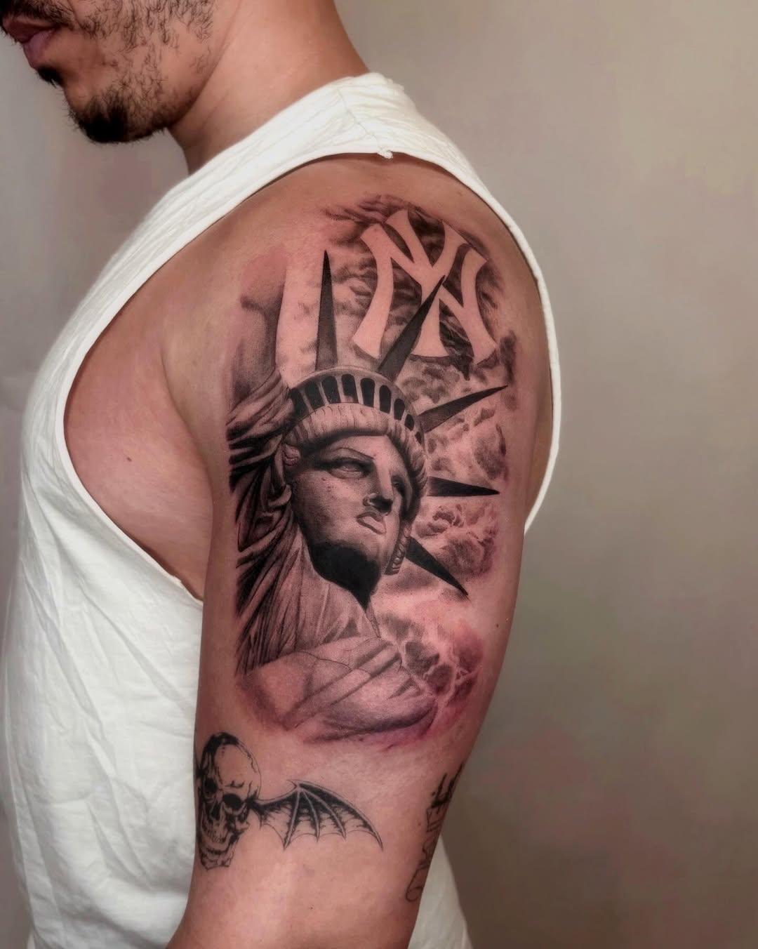Tattoo by @tattedbygnyc — realism, black_and_grey