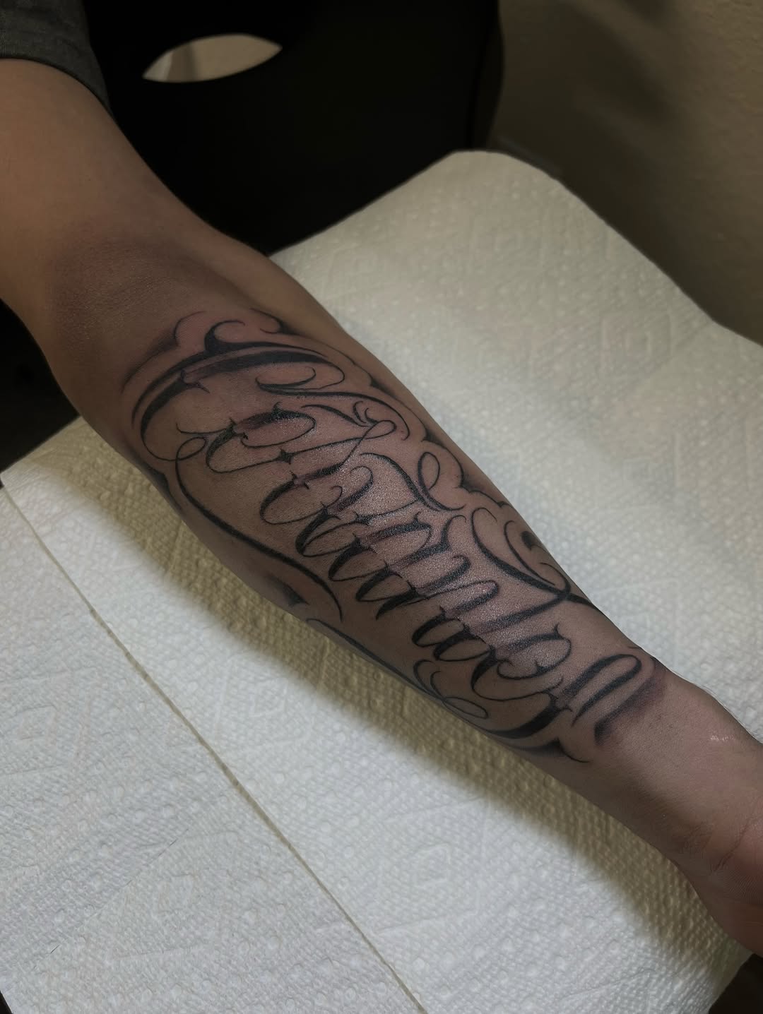 Tattoo by @tavoromero_19 — lettering_script, blackwork
