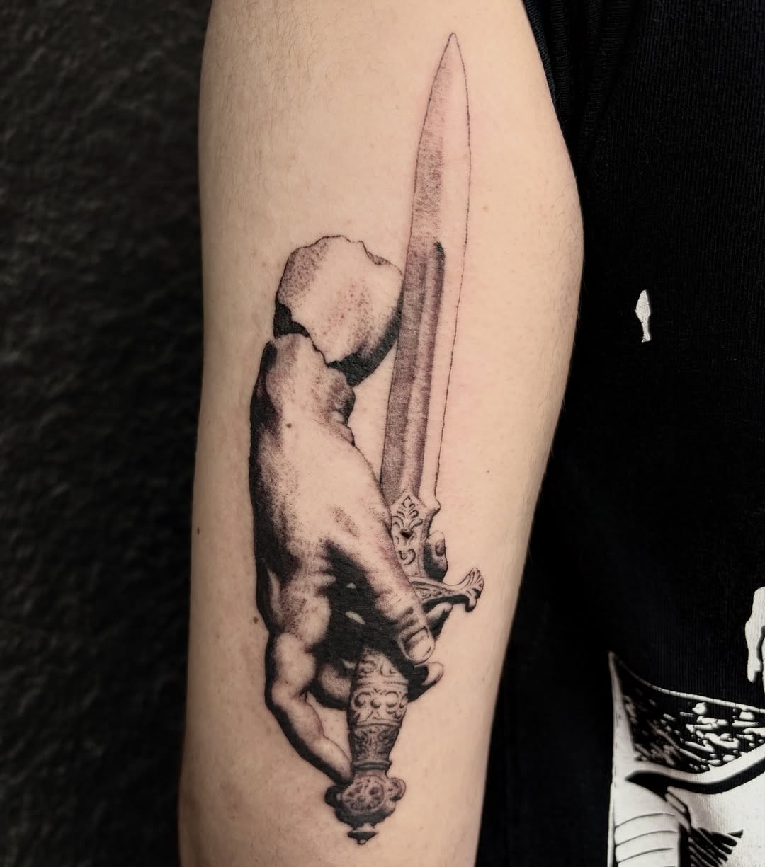 Tattoo by @emi.s.ink — realism, black_and_grey