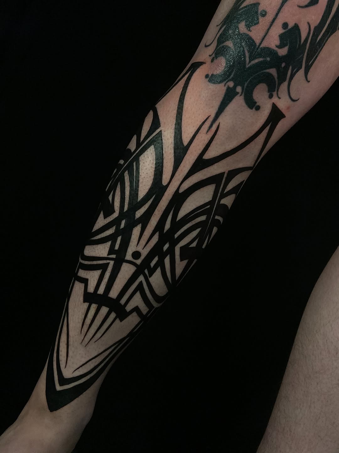 Tattoo by @baptism_black — tribal, blackwork