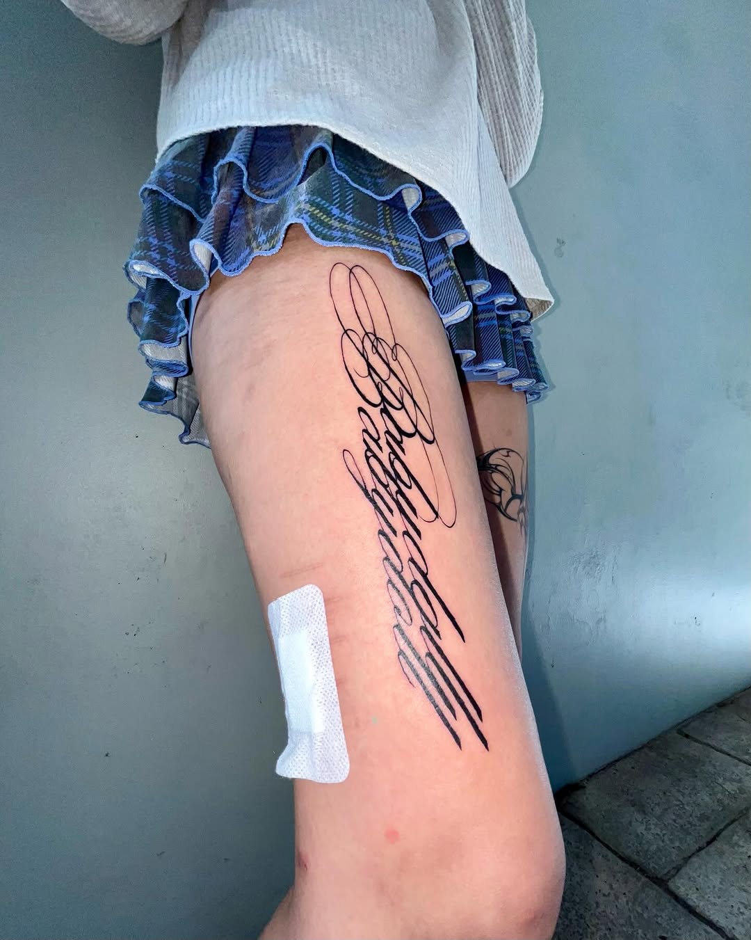 Tattoo by @mwah.ttt — lettering_script, fine_line