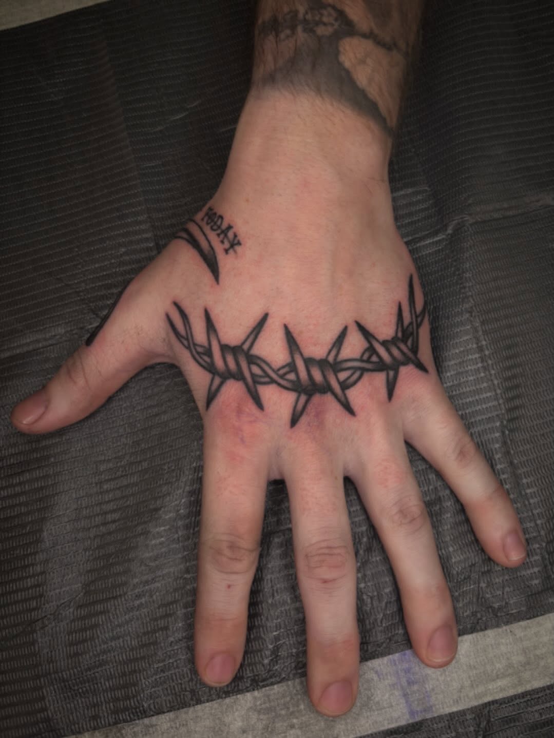 Tattoo by @brettattoos — illustrative, blackwork