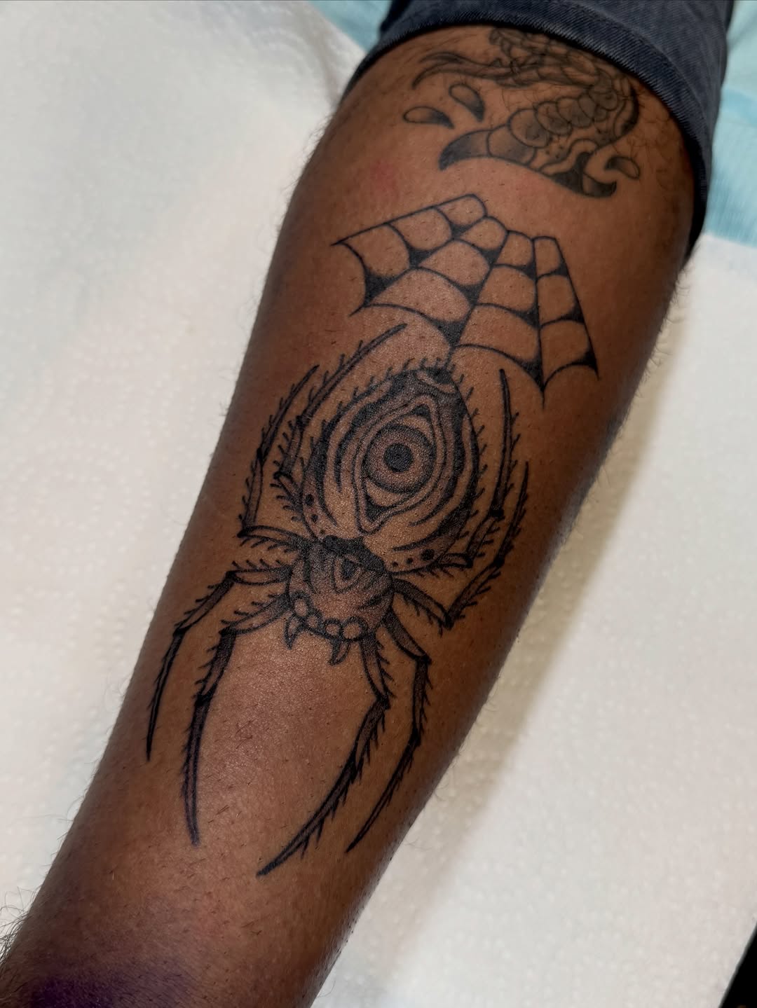 Tattoo by @cousins_tattoos — illustrative, blackwork