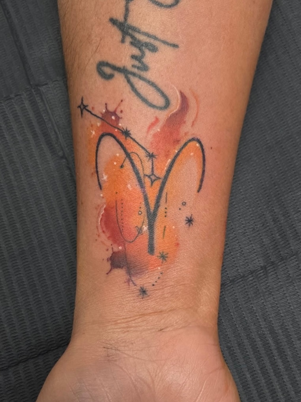 Tattoo by @jetblackninja_tattoo — watercolor