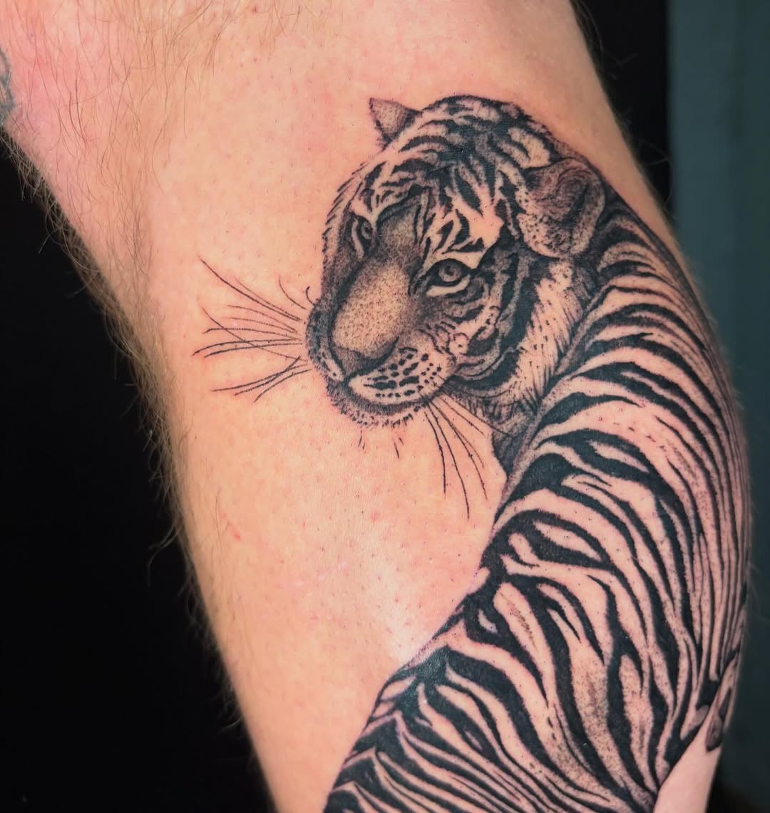 Tattoo by @black.thistle.tattoo — realism, black_and_grey