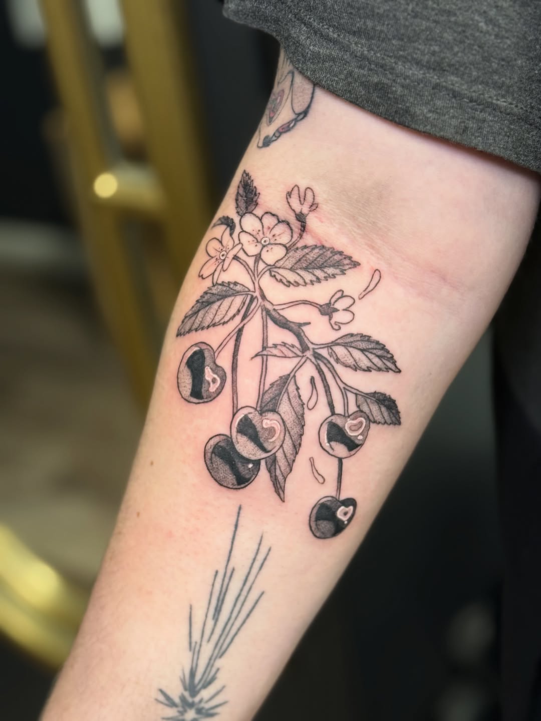 Tattoo by @scaledxwingstattoo — black_and_grey, fine_line