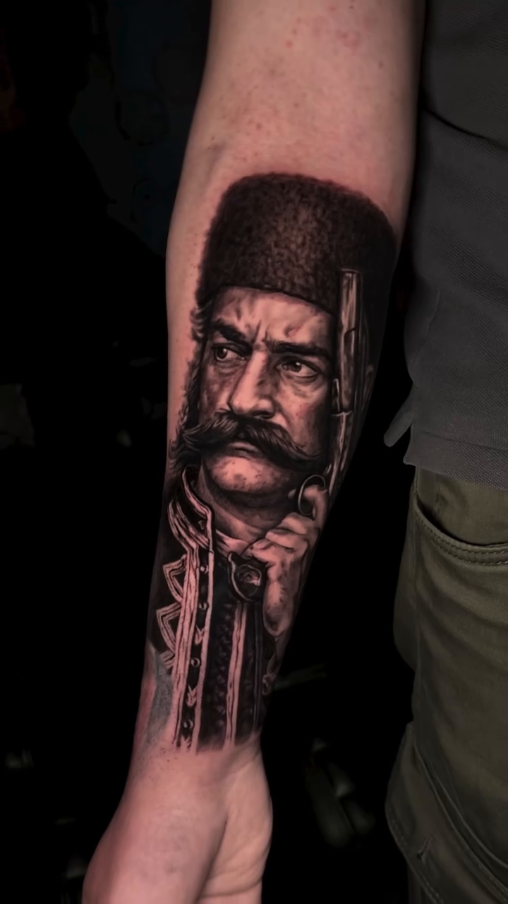 Tattoo by @ivan.tattoo.ic — realism, black_and_grey