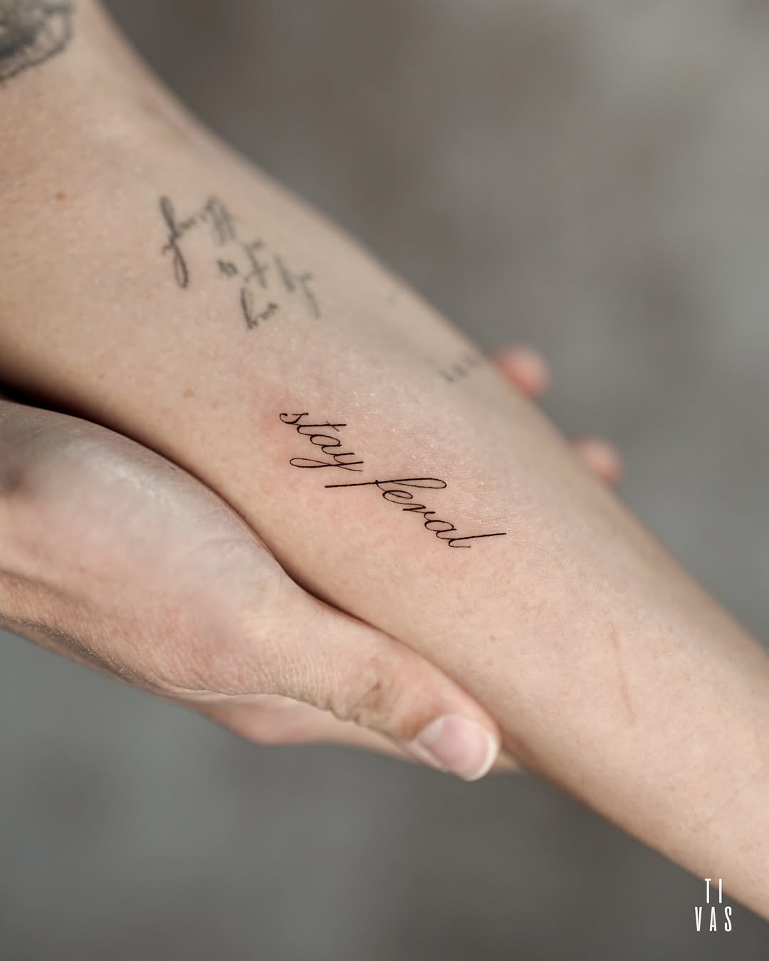 Tattoo by @tivas — lettering_script, fine_line