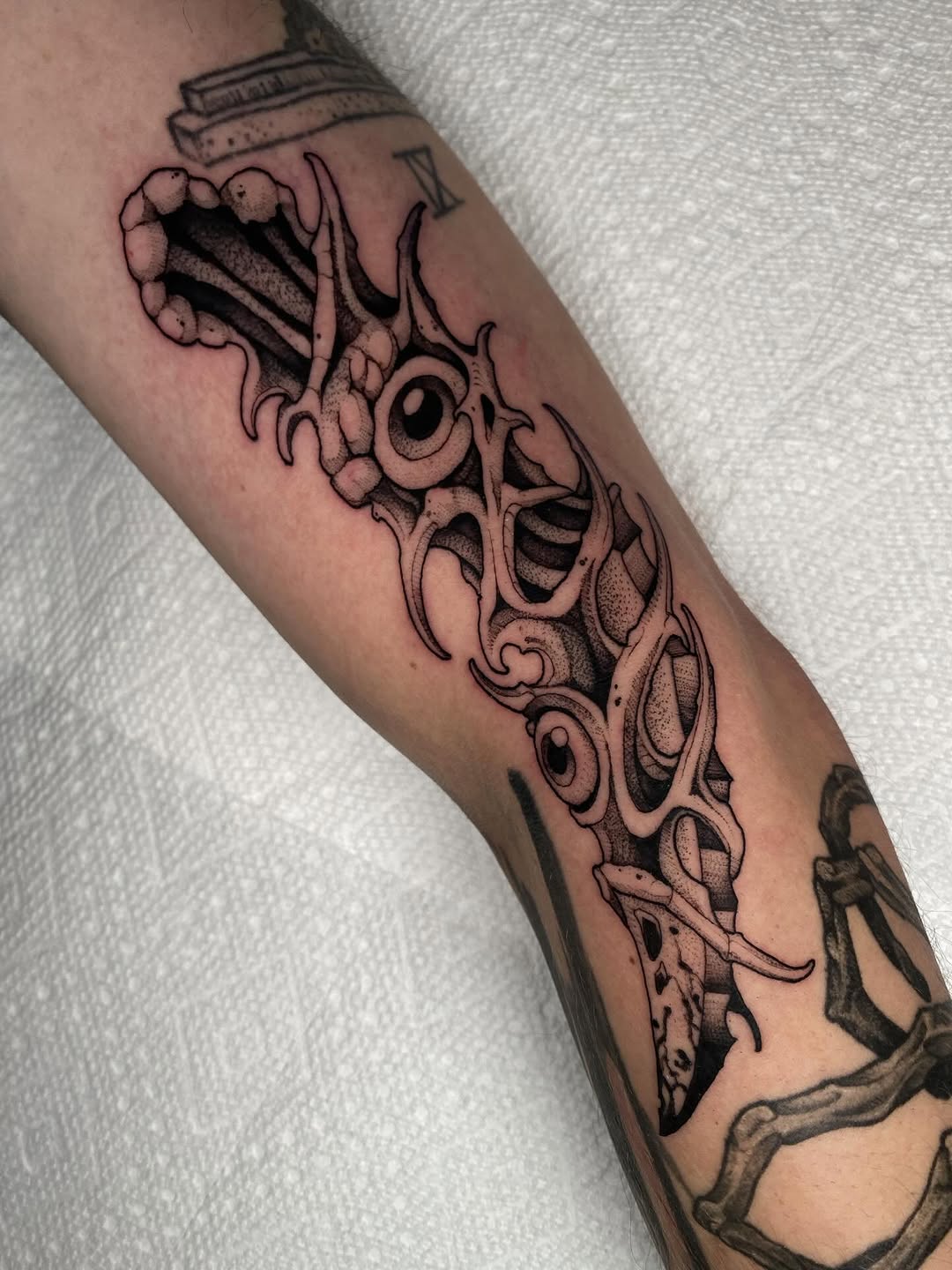 Tattoo by @scab.tailor — black_and_grey, dark_realism