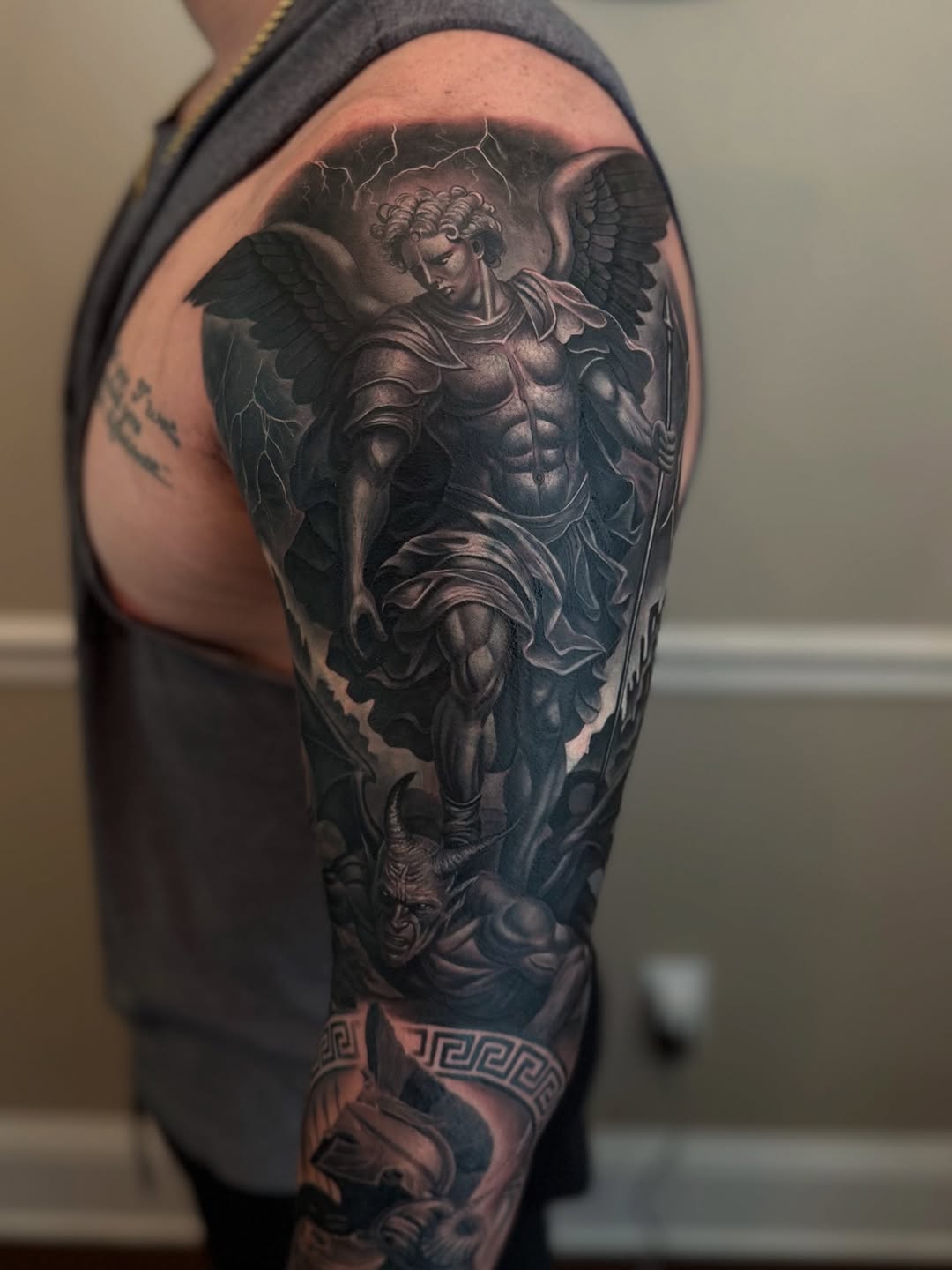 Tattoo by @angels__tattoo — realism, black_and_grey